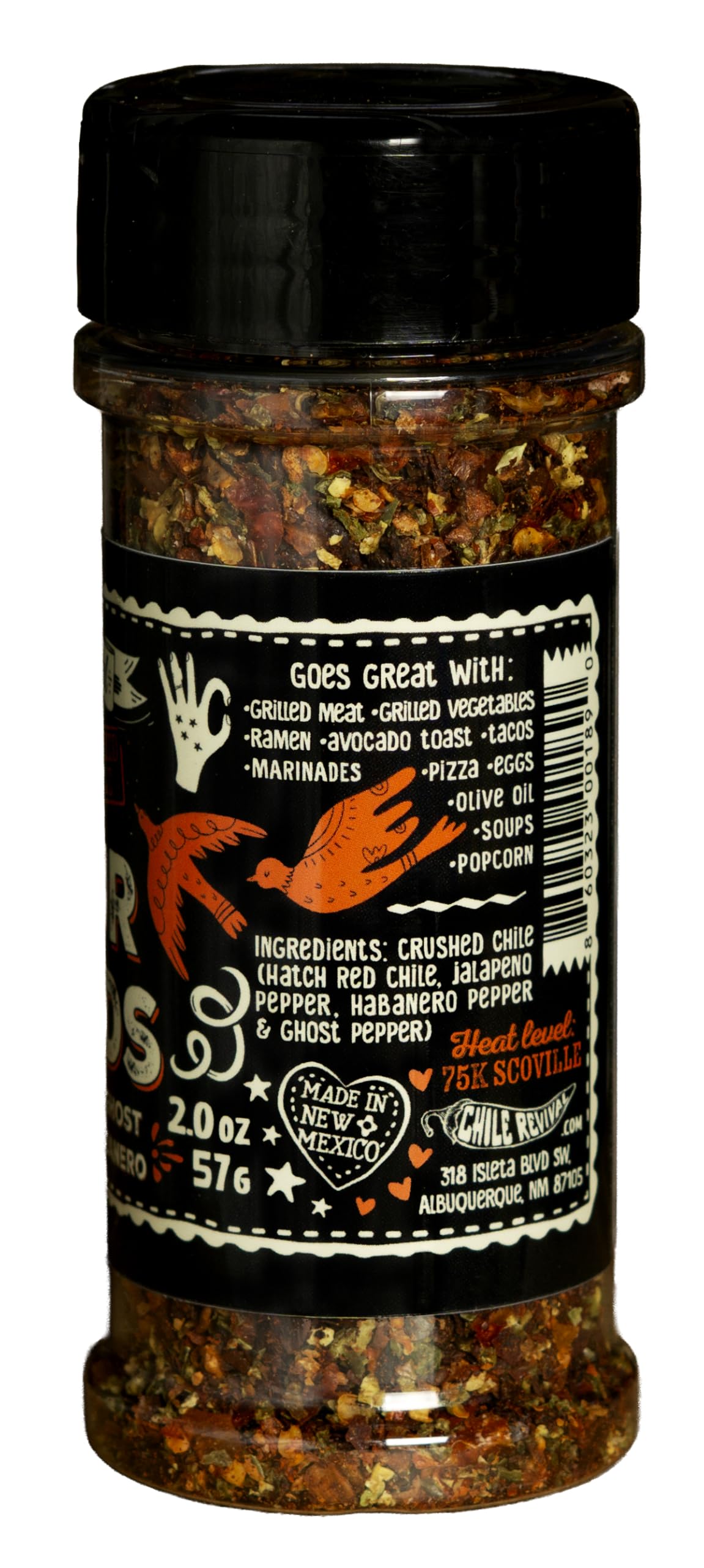 Chile Revival sprinkled on pizza in kitchen, adds bold flavor and heat