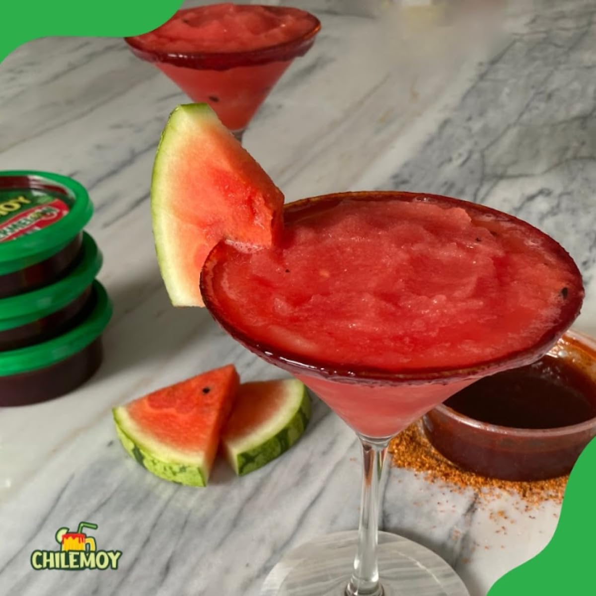CHILEMOY jar beside sliced watermelon showing pairing and fresh fruity enhancement