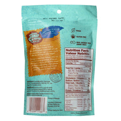 Chimes close-up of toffee texture and toasted coconut flakes highlighting crunchy flavor