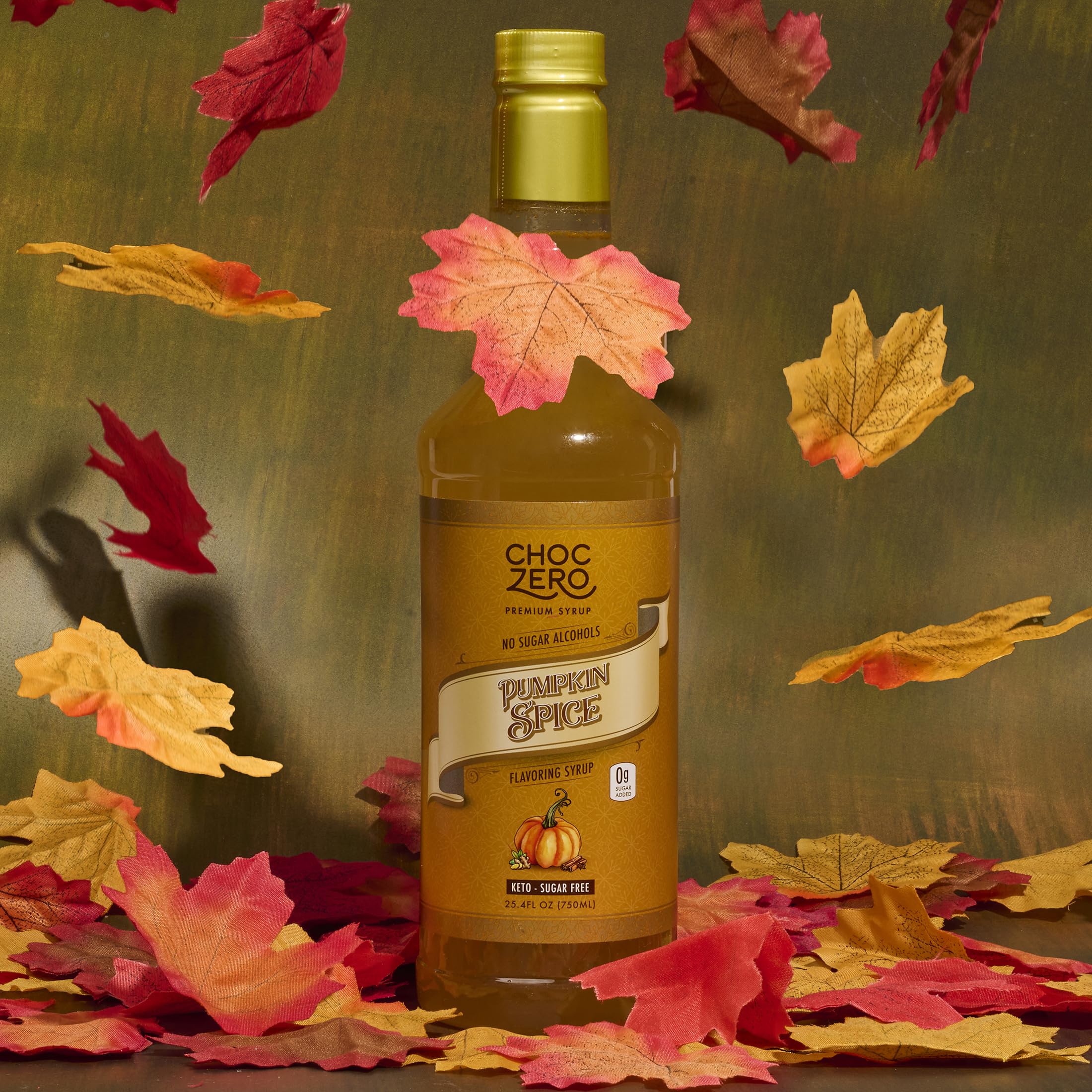 ChocZero bottle on a coffee table with fall decor, perfect for seasonal drinks