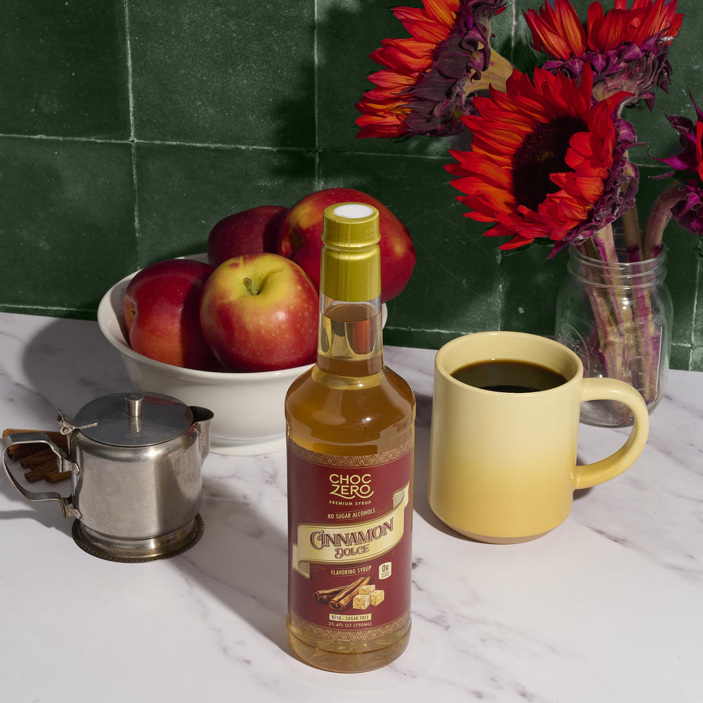 ChocZero bottle on a home cafe counter with desserts demonstrating recipe use
