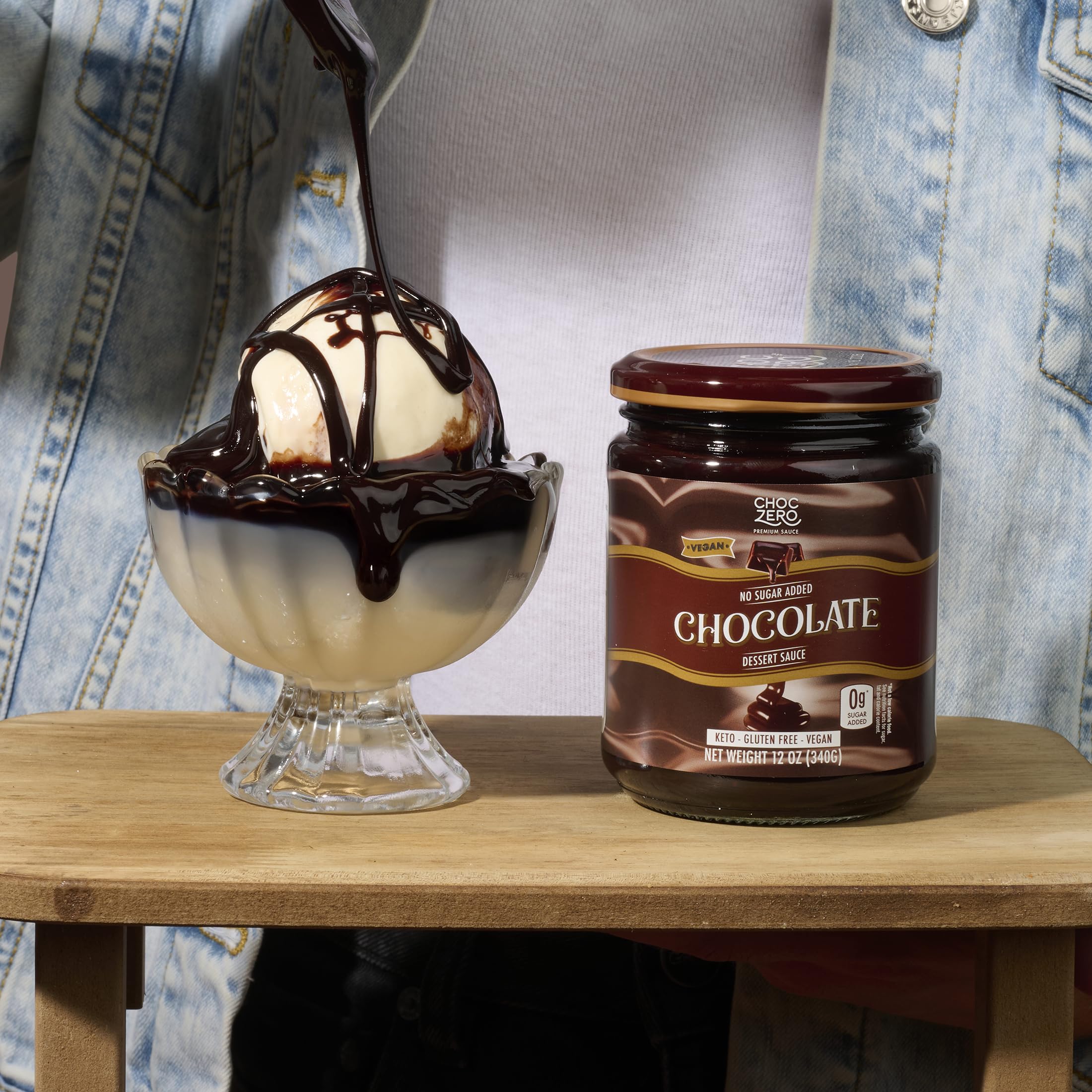 ChocZero next to measuring spoon showing serving size and low net carbs