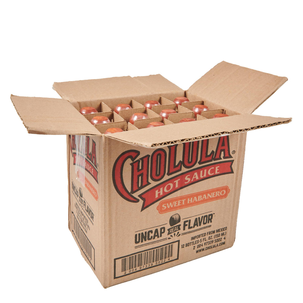 Cholula bottle front view showing label and wooden cap for easy pouring