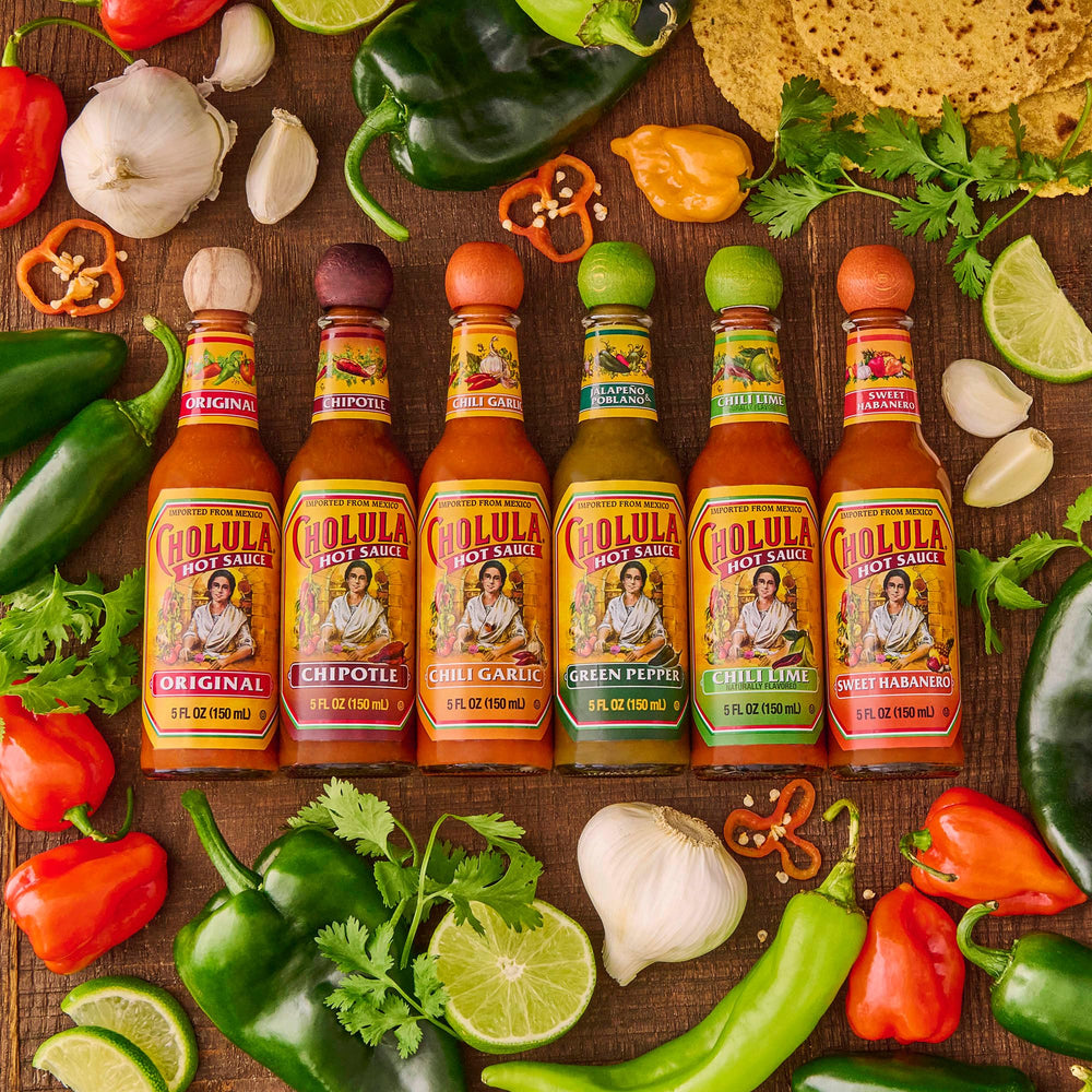 Cholula bottles in gift box on kitchen counter offering present-ready benefit