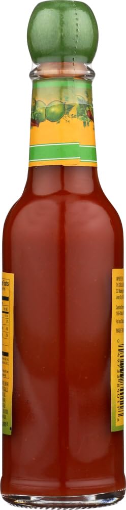 Cholula Chili Lime drizzled on fish tacos adding bright citrus heat to dish