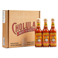 Cholula front packaging shows three bottles and gift box, ready to gift