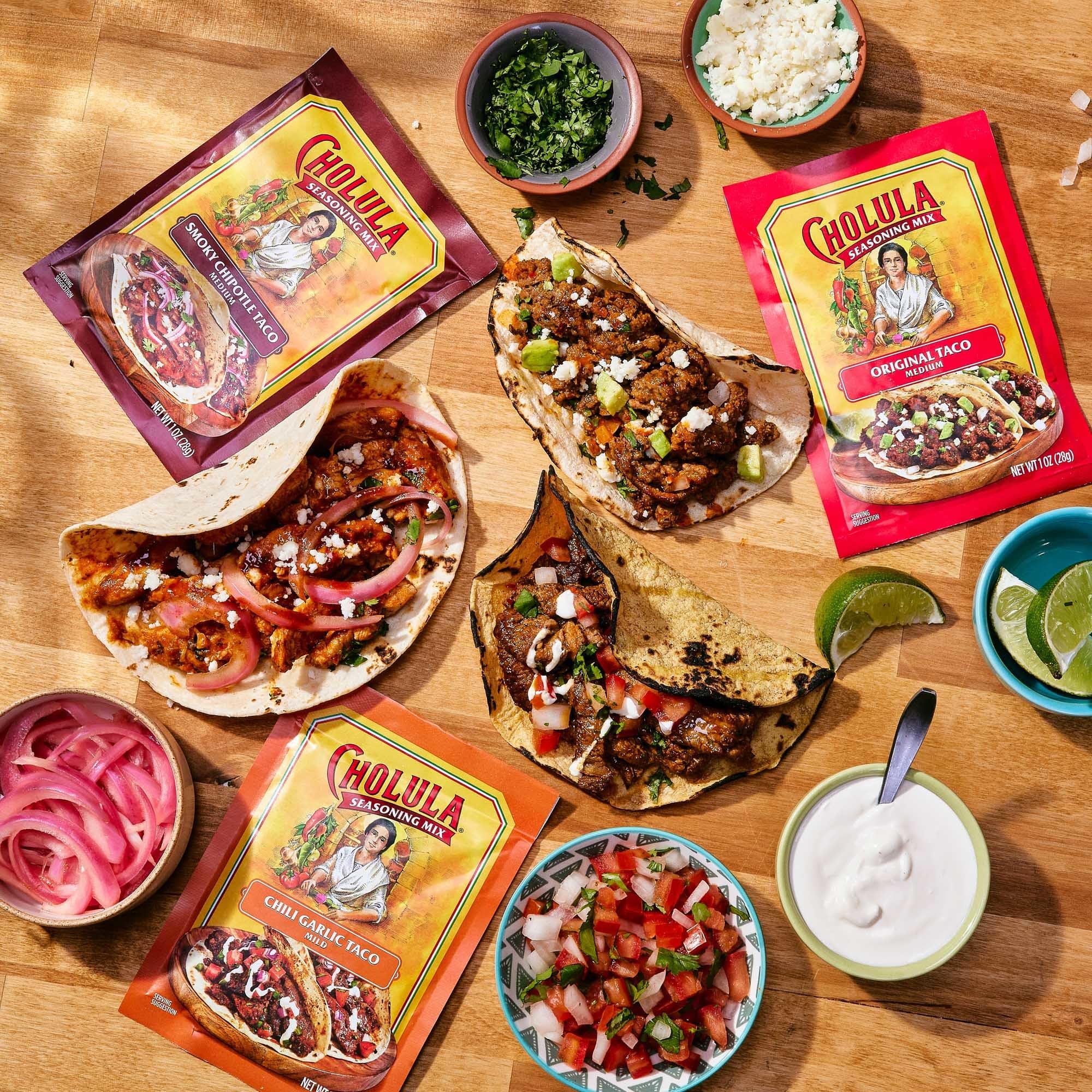 Cholula taco night scene with family serving tacos showcasing easy meal prep