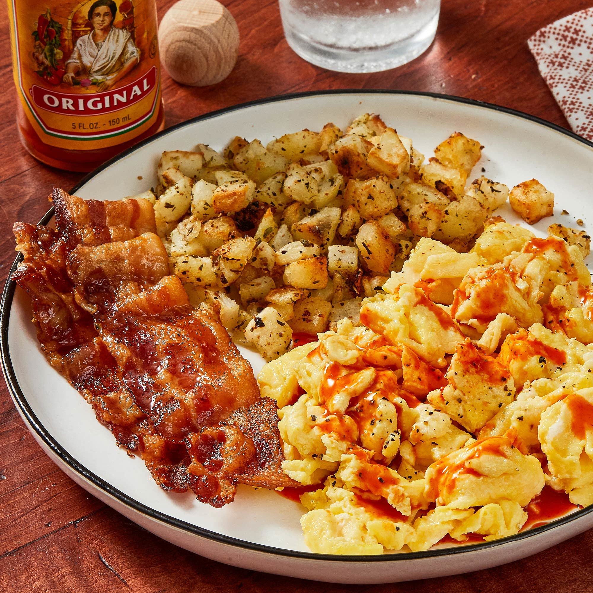 Cholula Original drizzled on pizza in lifestyle setting benefit enhances dishes