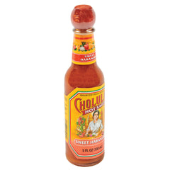 Cholula wooden cap close-up highlighting signature design and grip