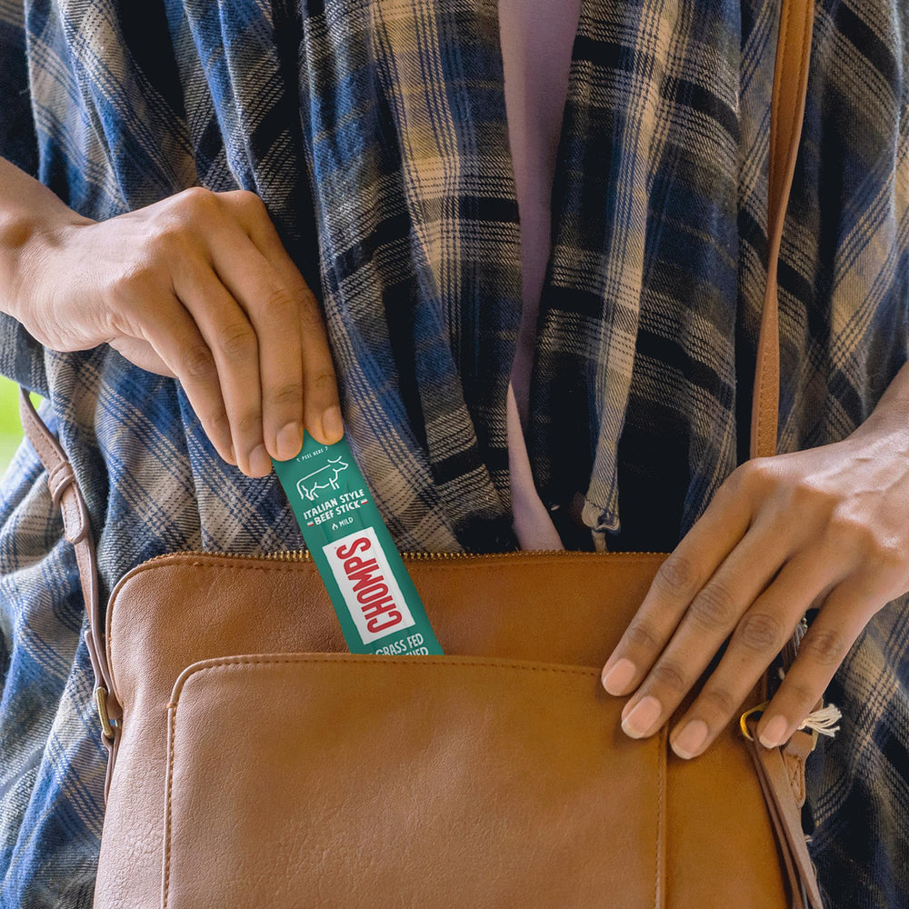 Chomps stick next to measuring tape illustrating single-stick size