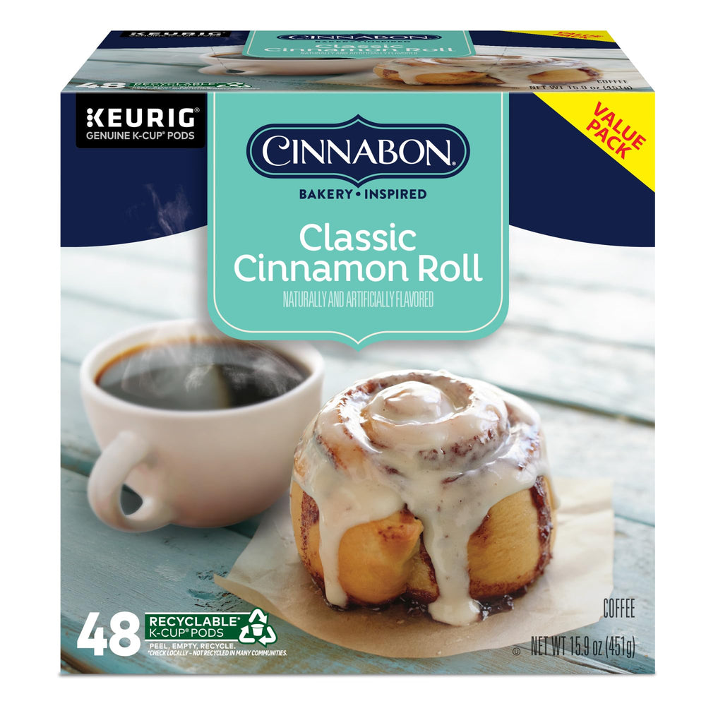 CINNABON cup styled with pastry in breakfast setting suggesting indulgence