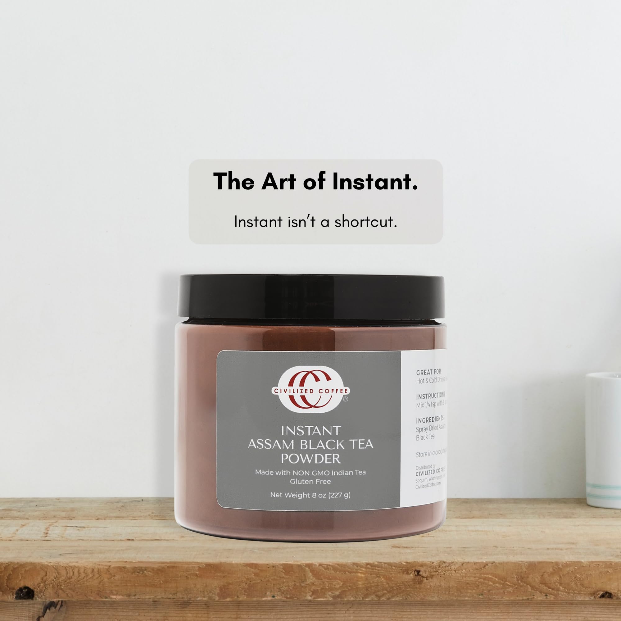 Civilized Coffee 8 oz jar beside a measuring spoon showing portion guidance