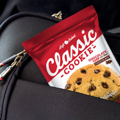 Classic COOKIE next to a hand for scale showing 3oz portion benefit