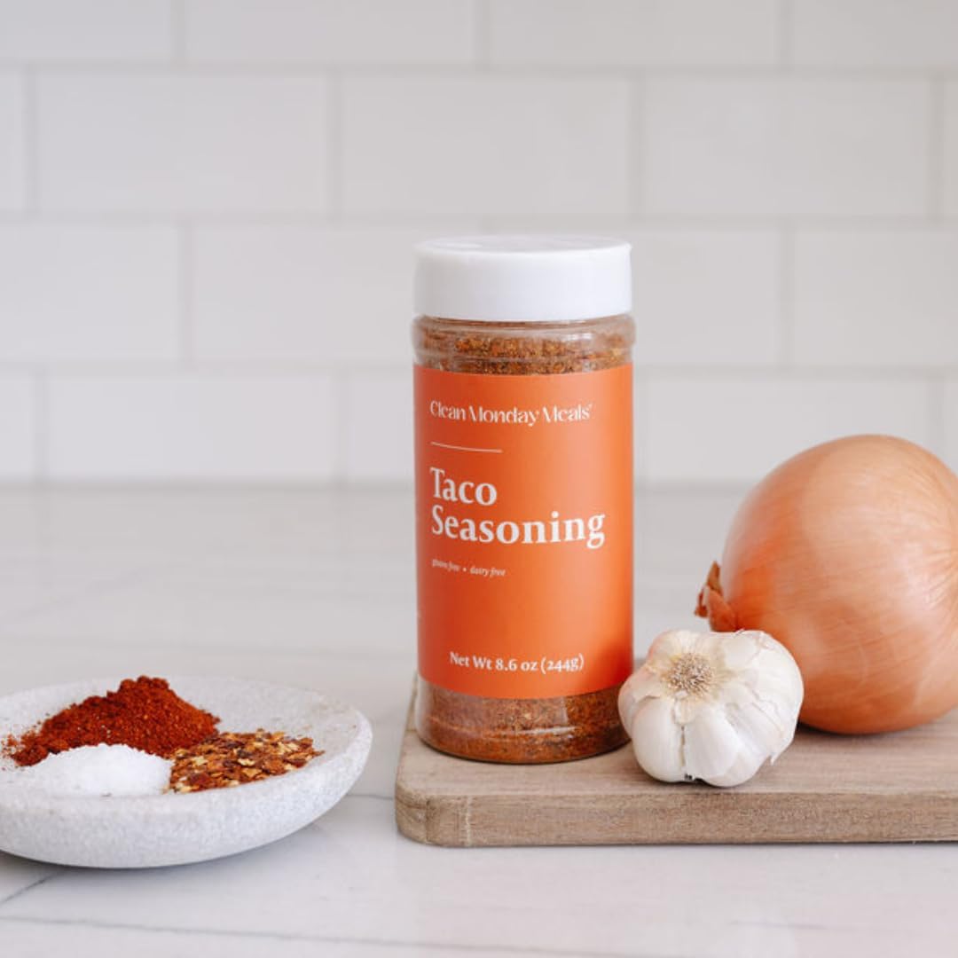 Clean Monday Meals spice rub on chicken before grilling showing how it creates savory crust and aroma