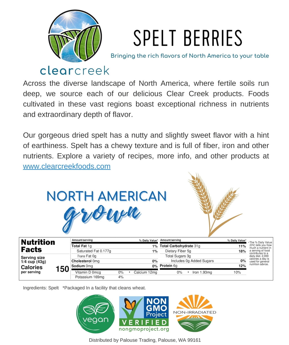 CLEAR CREEK spelt berries beside measuring cup showing quantity and scale
