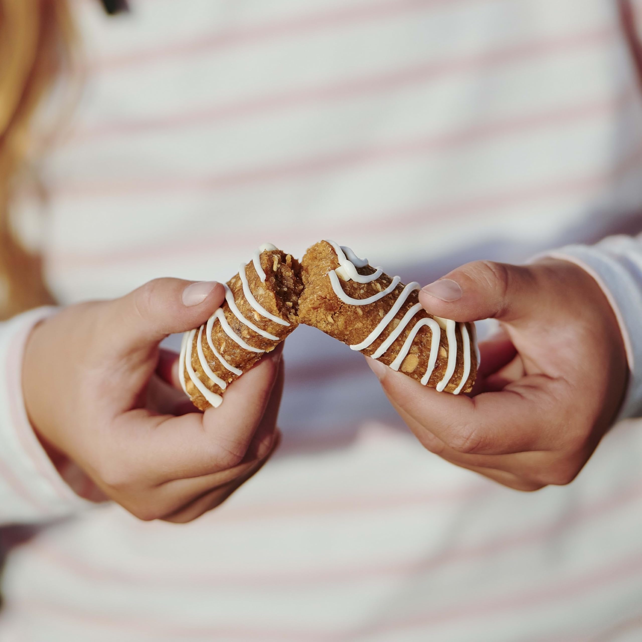 Clif Kid ZBar size comparison in hand showing portable kid-friendly portion