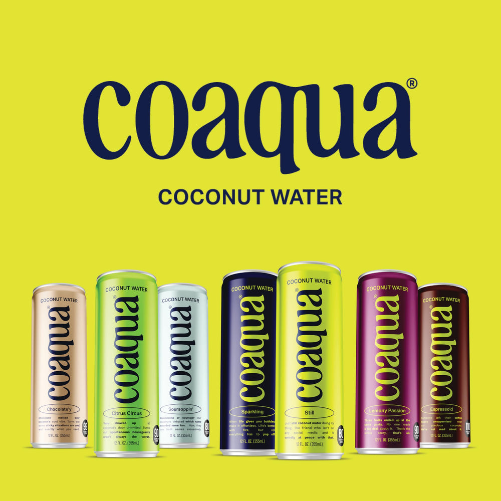 CoAqua cans on a picnic table illustrating portable hydration and eco choice