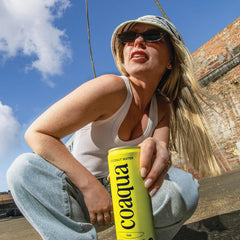 CoAqua can close-up label highlighting natural ingredients and low sugar benefit
