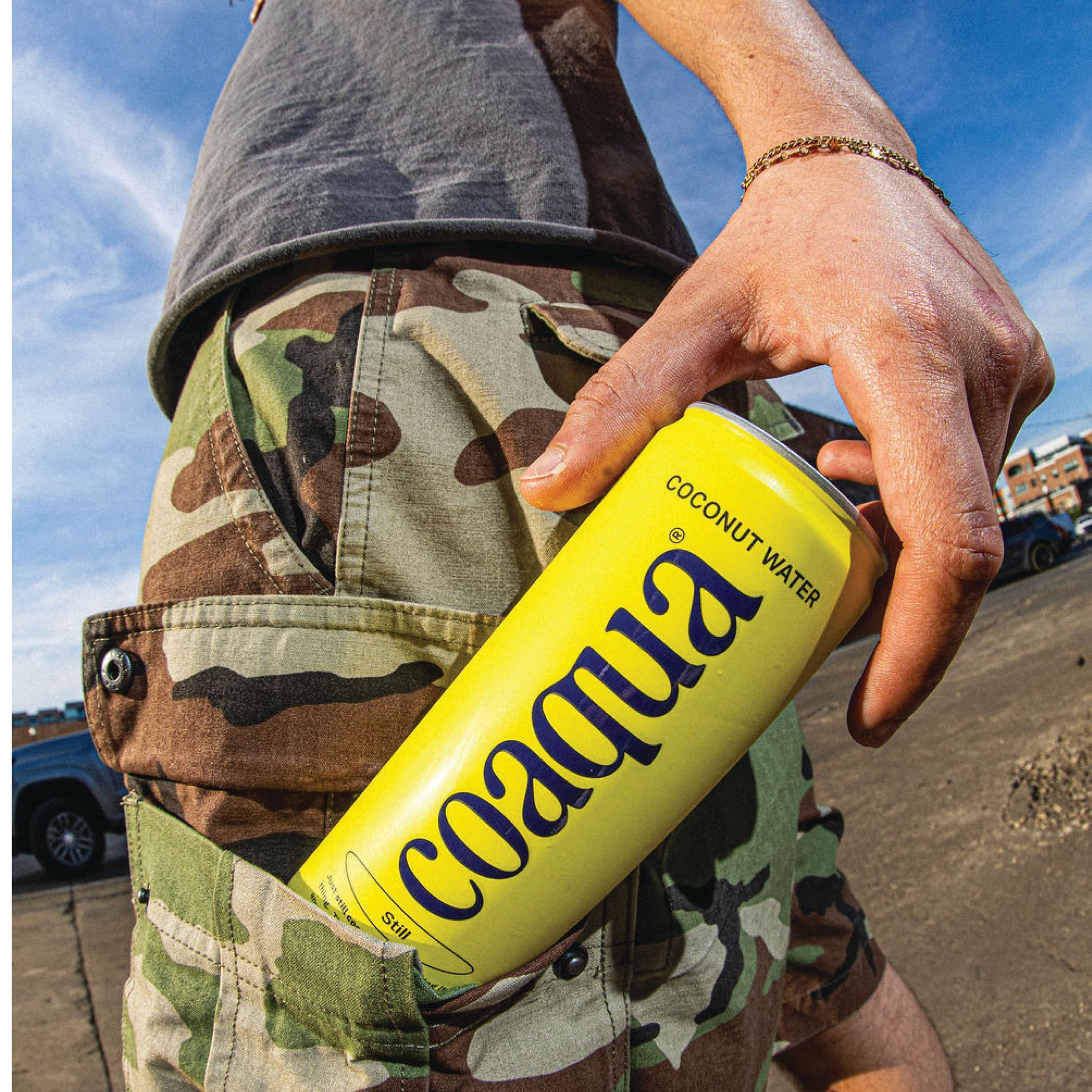 CoAqua pouring into a glass to show clear liquid and refreshing hydration benefit