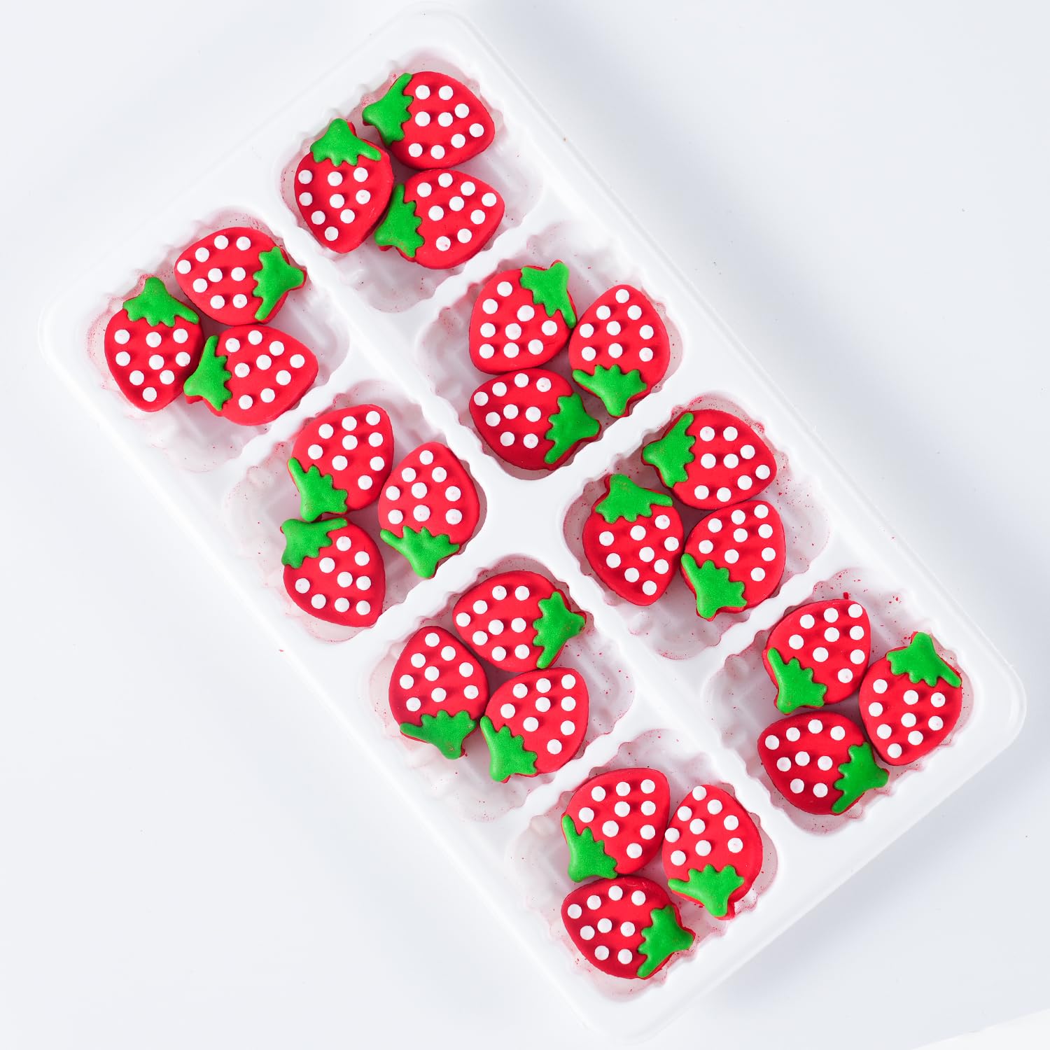 cobakey strawberry topper placed on cupcake adding instant spring appeal