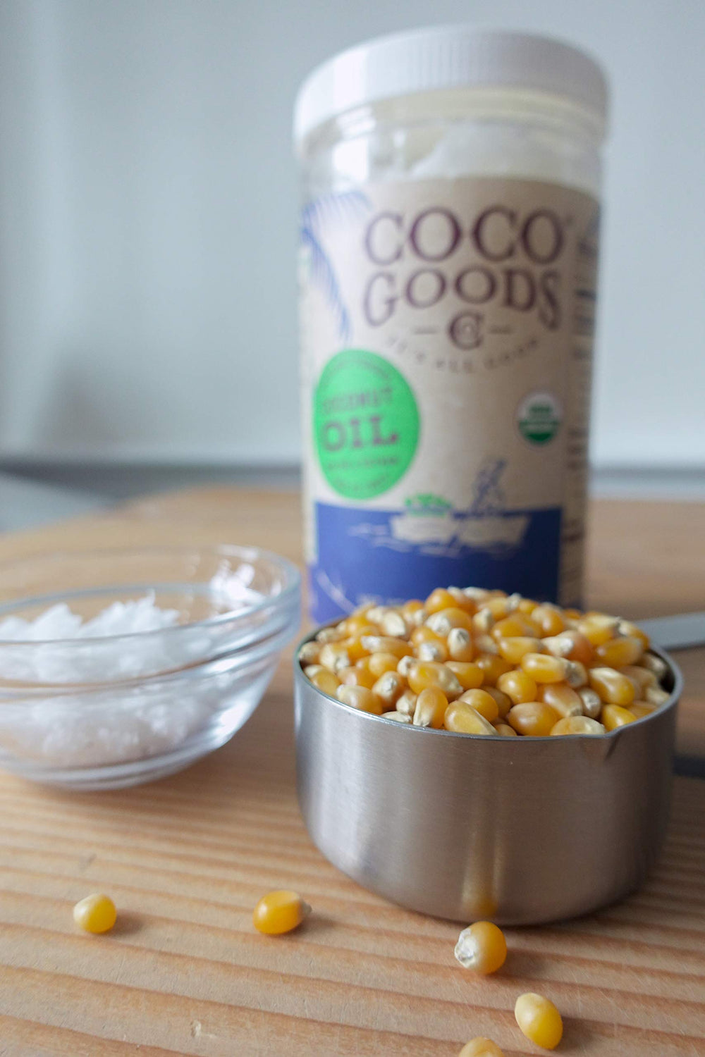 COCOGOODSCO scoop of oil showing solid-to-liquid consistency and easy application benefit