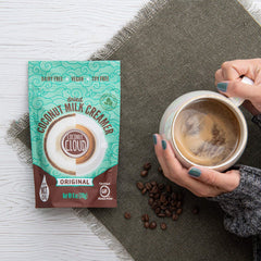 Coconut Cloud dissolving in coffee creating creamy texture and richer flavor