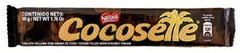 Hand holding a Cocosette wafer to show size and convenient single-serve benefit