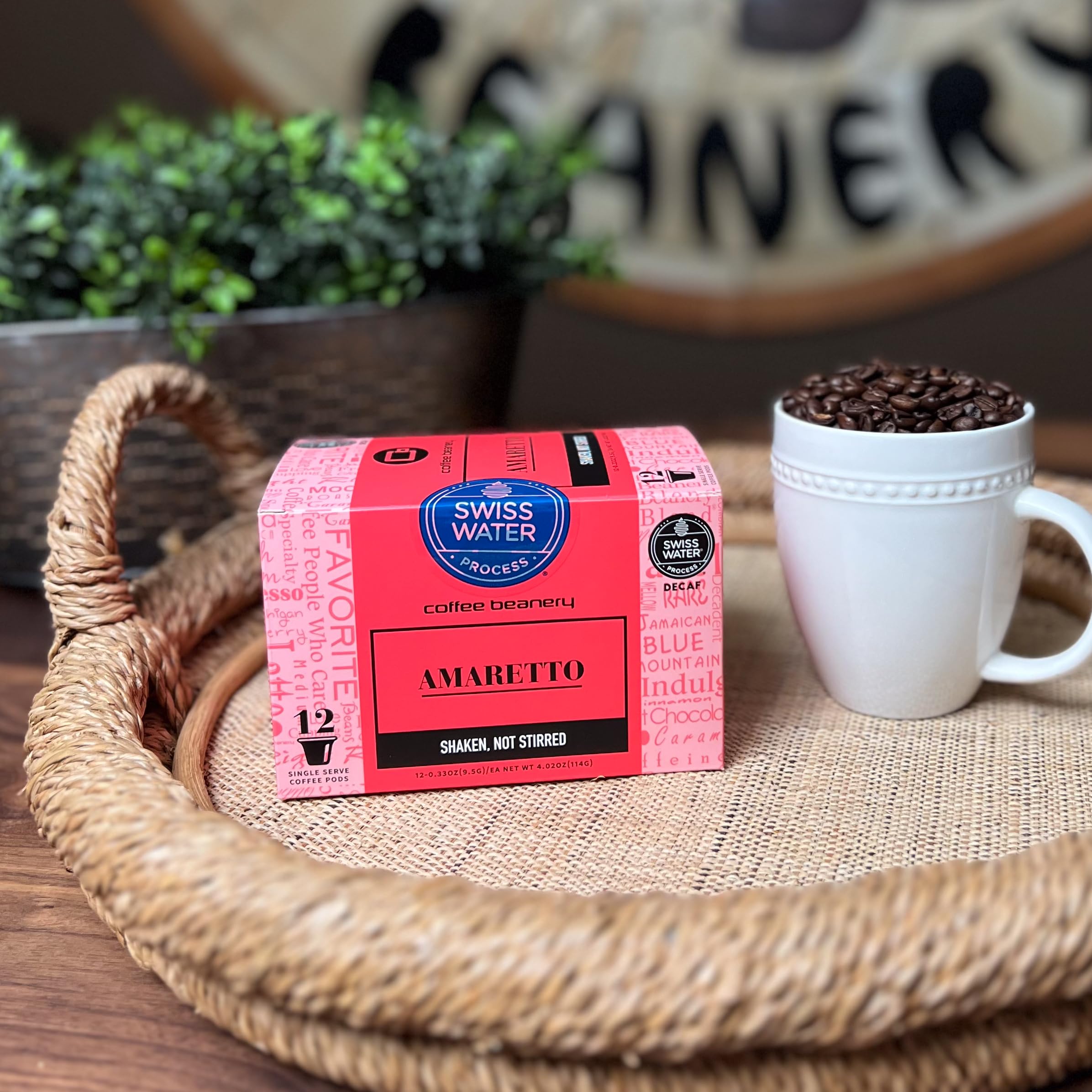 Coffee Beanery amaretto pod inside a K-Cup brewer brewing fresh cup quickly