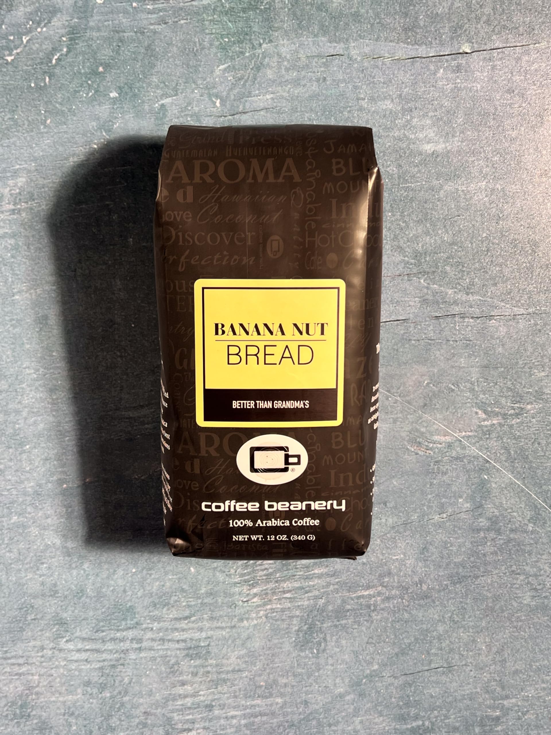 Coffee Beanery cup beside banana nut bread slice illustrating complementary pairing