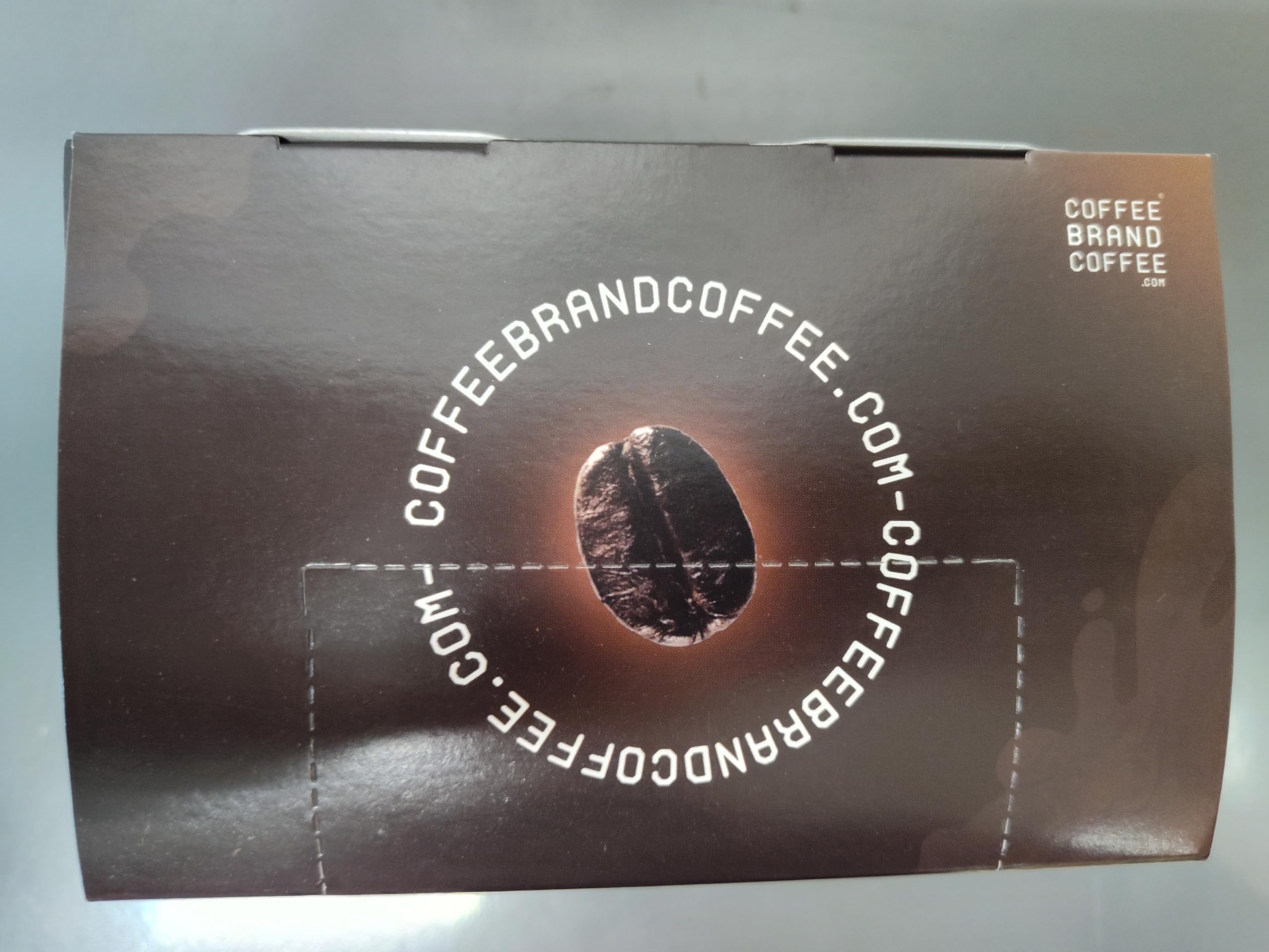 Coffee Brand Coffee opened pod revealing sealed grounds for locked-in freshness
