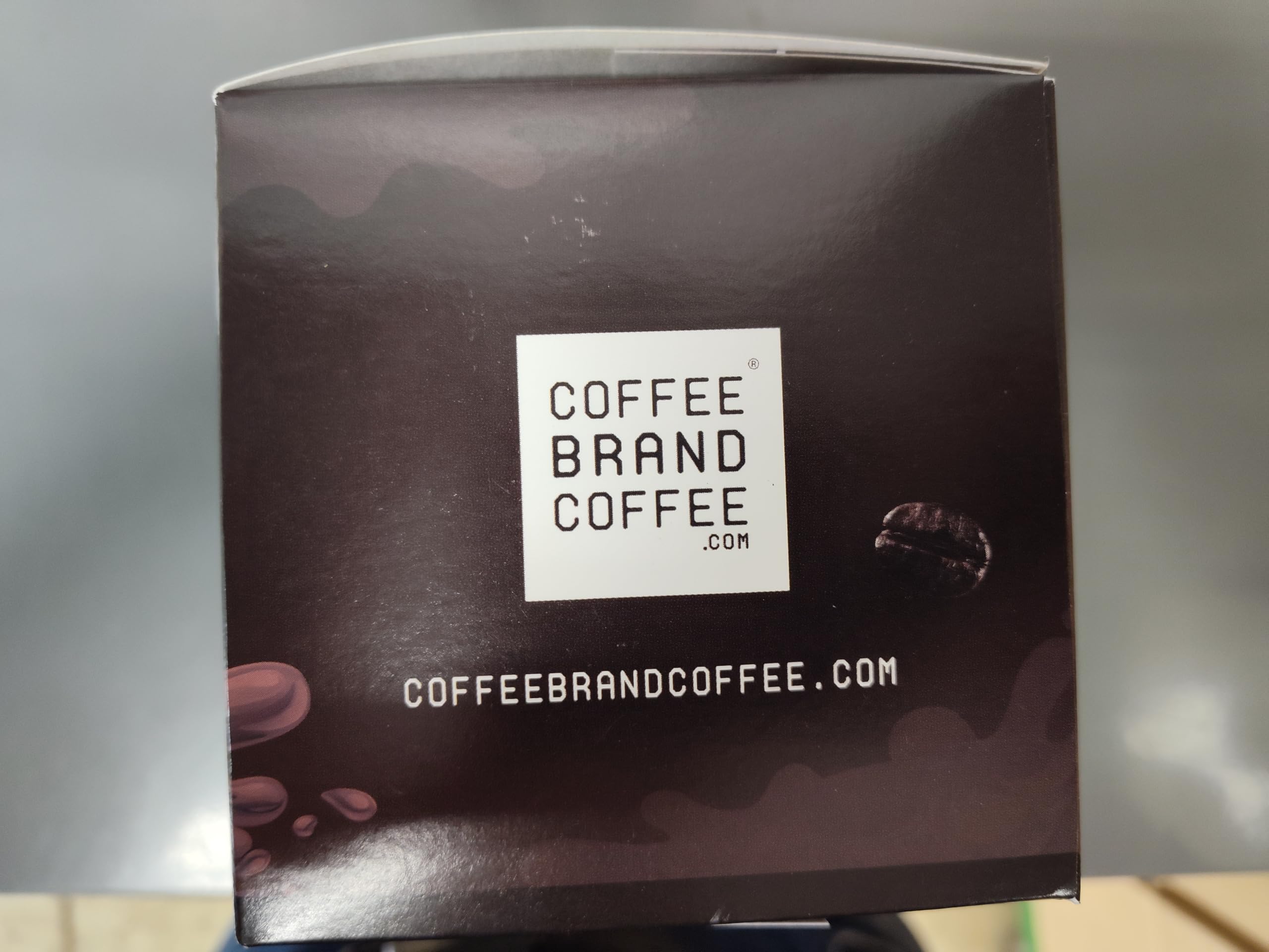 Coffee Brand Coffee pod held in hand to show size and easy handling benefit