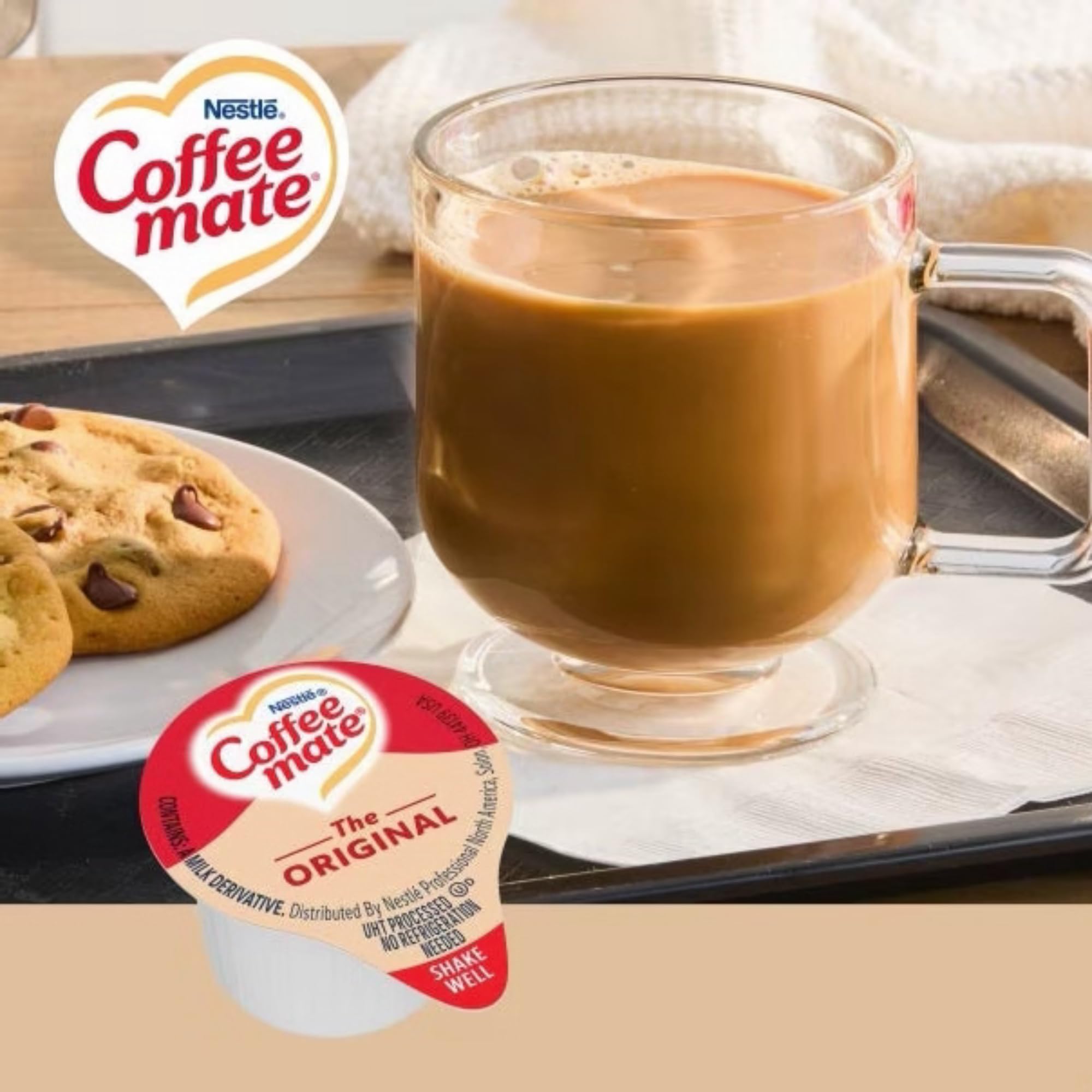 Open Coffee Mate box displaying individual tubs for grab-and-go convenience