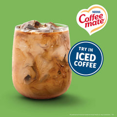 Coffee mate pouring a smooth creamer into coffee to enhance flavor and texture