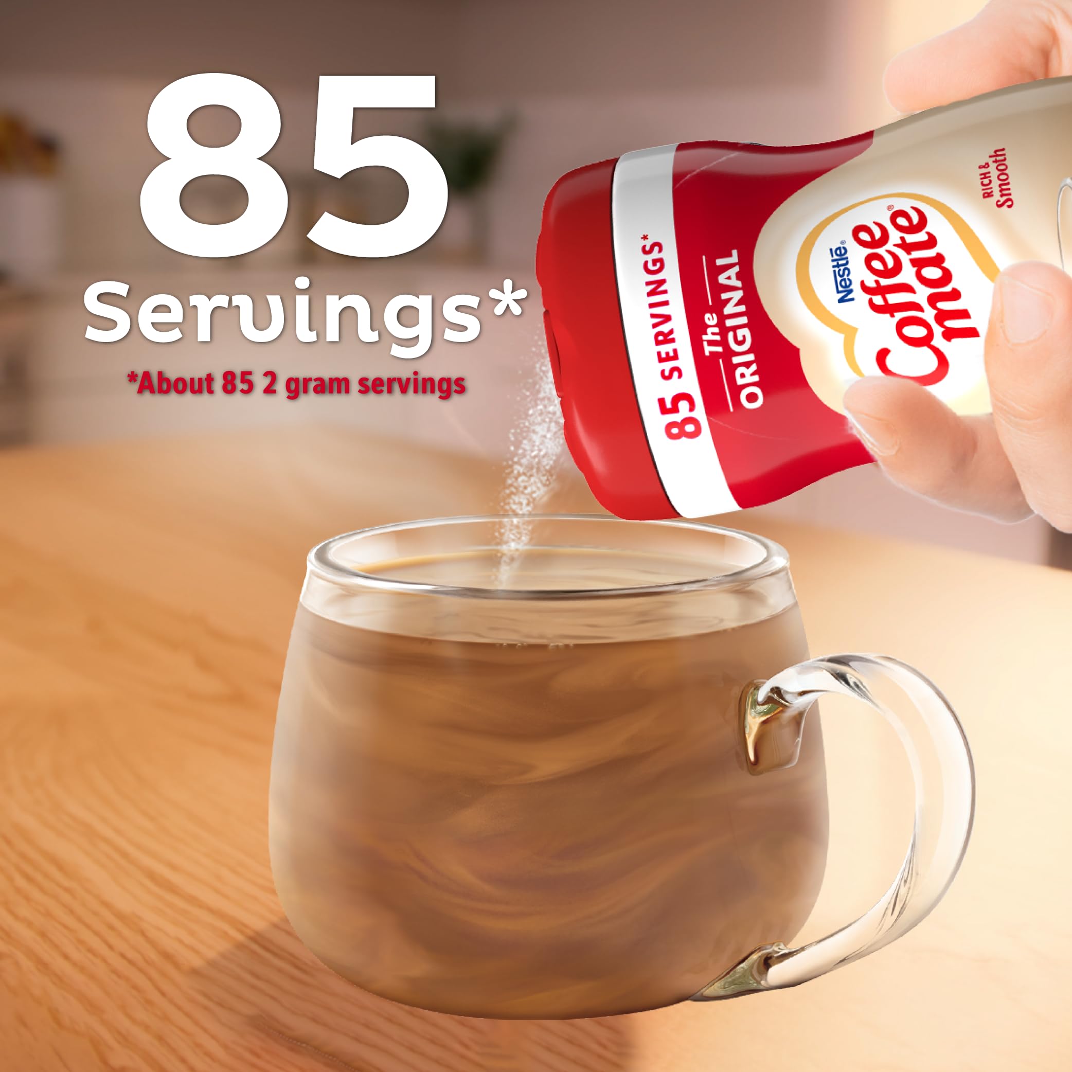 Coffee mate measured on spoon ready to add for consistent creamy flavor