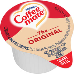 Coffee-mate tub being poured into a coffee cup demonstrating smooth blending and portion control