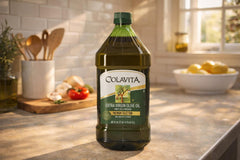 Colavita bottle beside measuring cup for size and volume comparison convenience