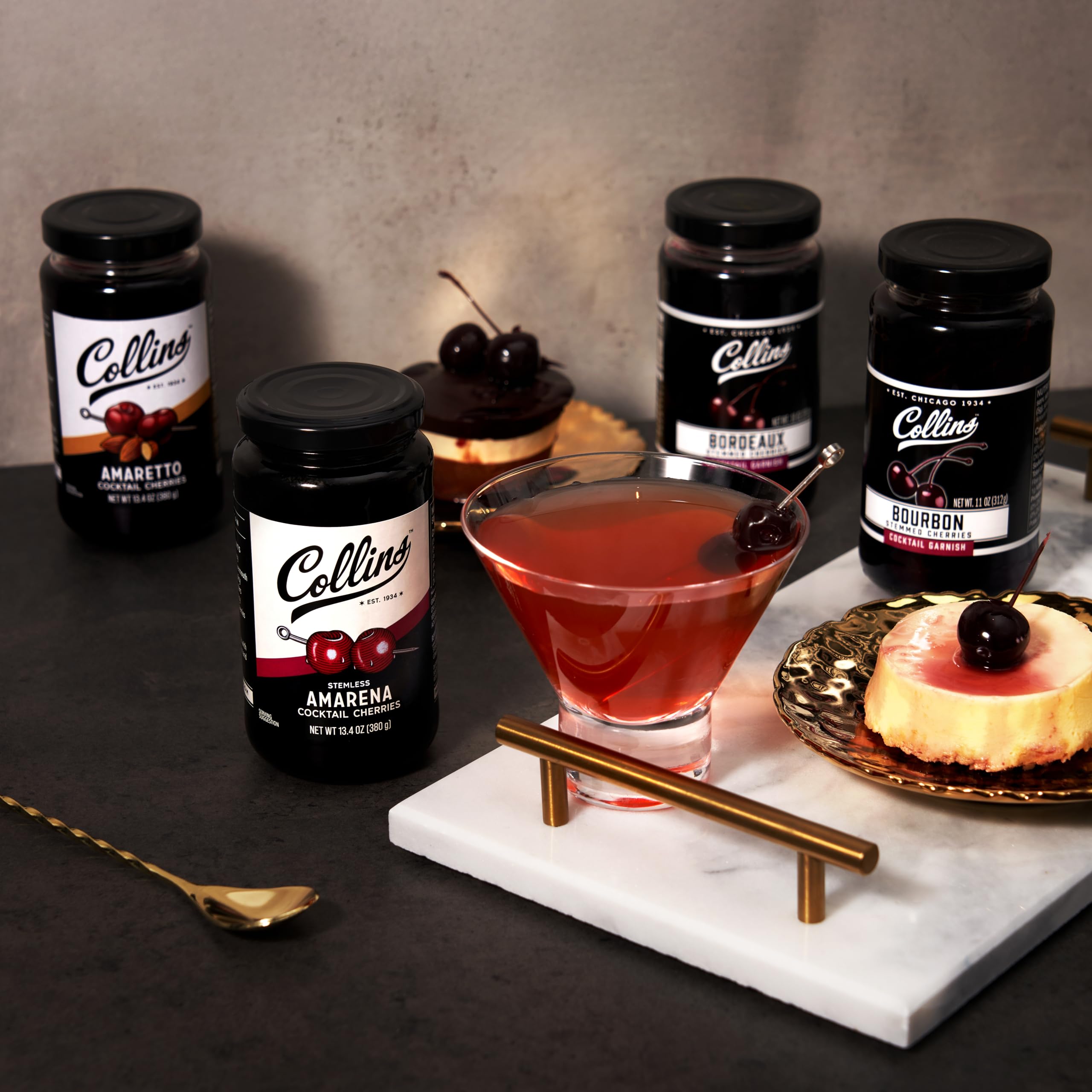 Collins Chicago cherry beside a spoon to show 13.4 oz jar scale and portioning benefit