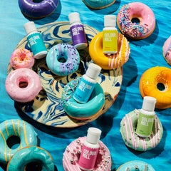 Colour Mill Purple, Sky Blue and Teal bottles arranged to show color variety