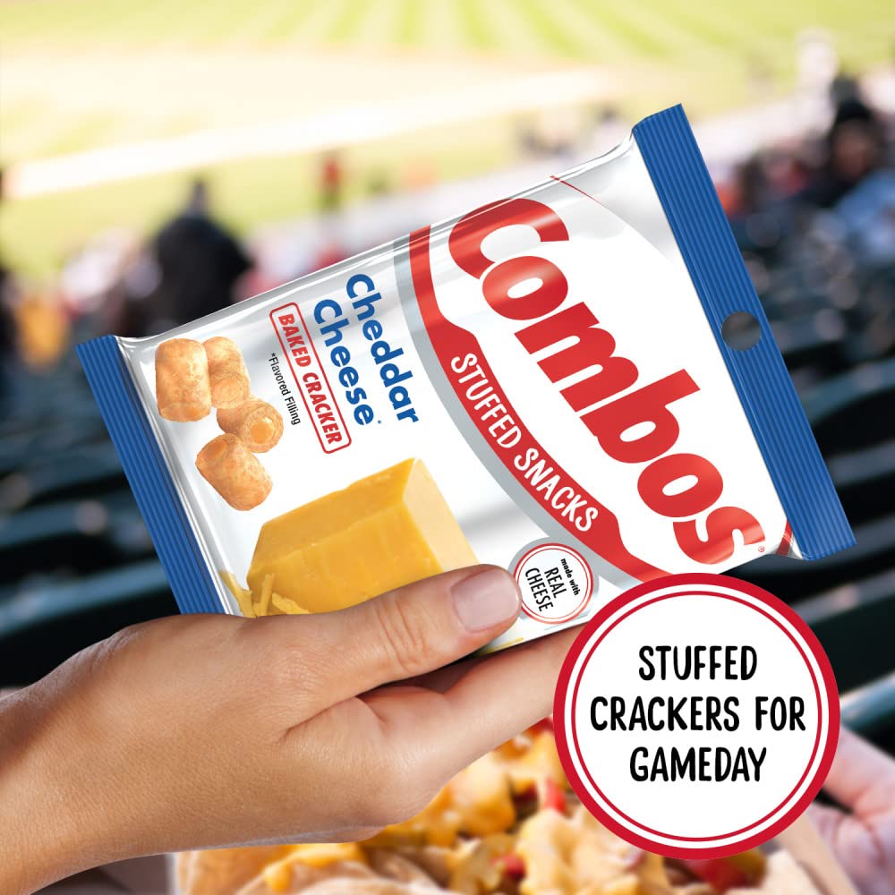 Combos held in hand beside ruler for scale, indicates convenient 6.3-ounce size