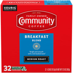 Community Coffee brewed cup pouring from Keurig with steam for a fresh morning cup