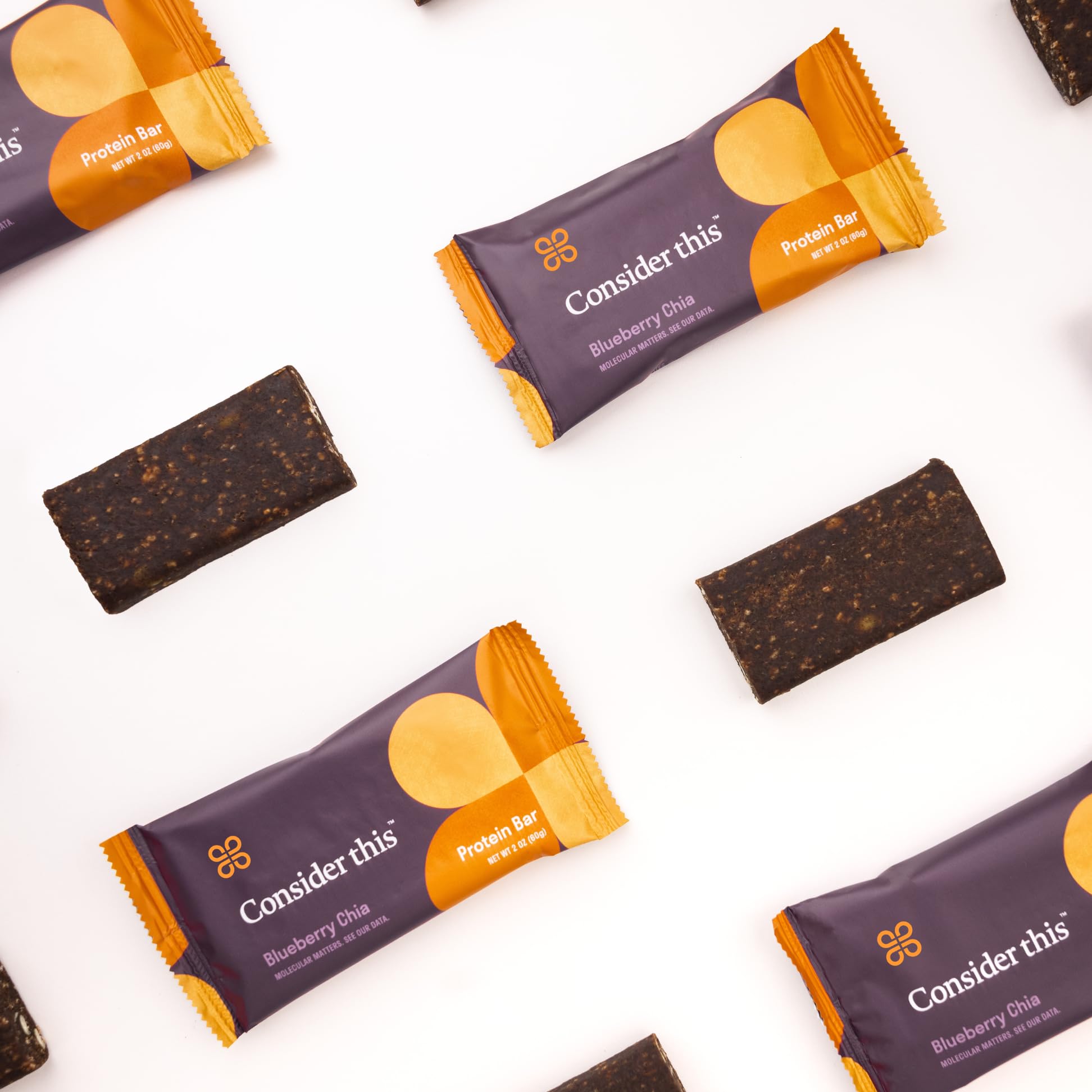Consider This bar beside a cup of tea in a relaxed setting showing an allergy-friendly snack moment