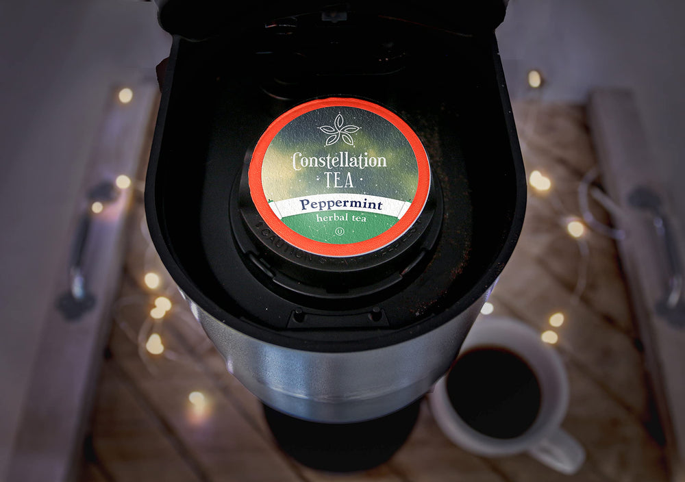 Brewed cup from Constellation Tea pod displaying clear brewed color
