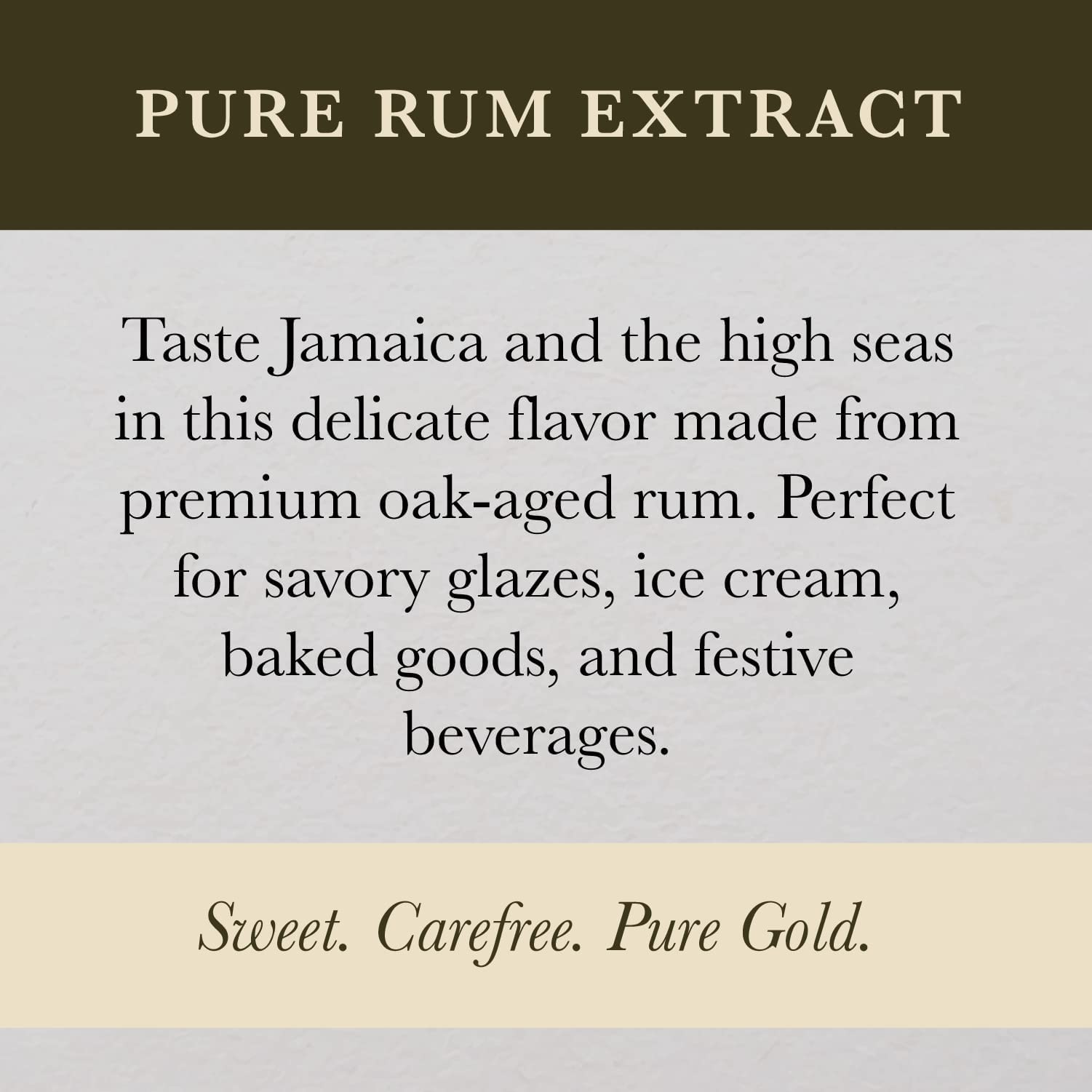 COOK'S rum extract being measured with a teaspoon showing precise concentrated dosing benefit
