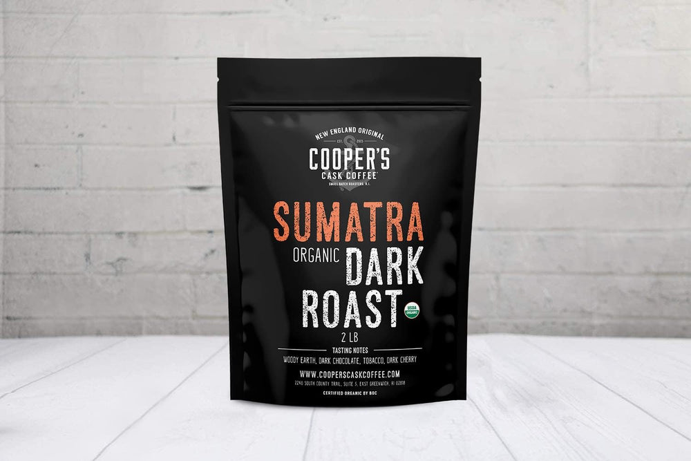 Cooper's Cask close-up of roasted Sumatra whole beans, shows rich dark roast texture