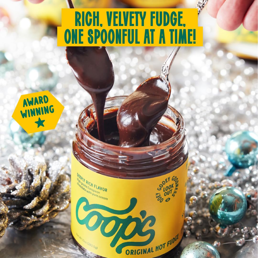 Coop's hot fudge on a spoon showing thick scoopable texture for easy topping