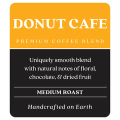 Copper Moon opened pod revealing ground coffee and rich bean texture