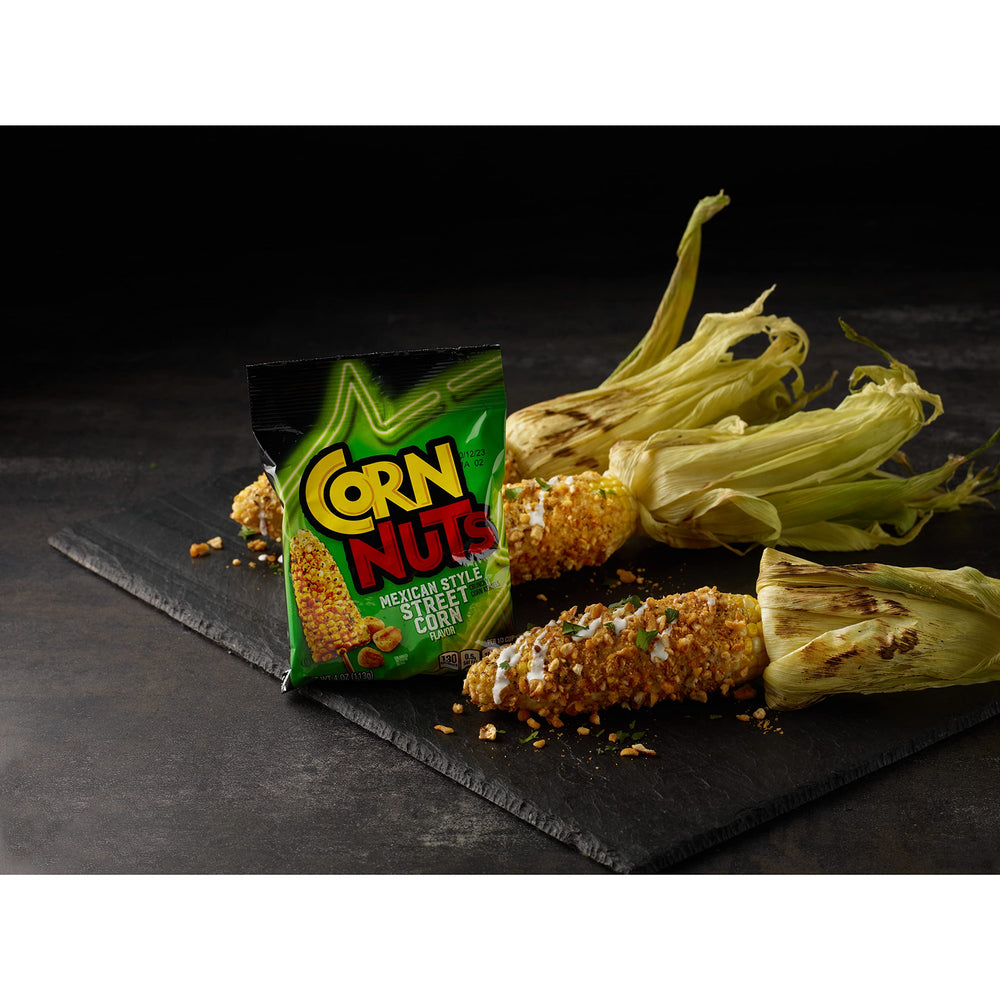 Hand holding a 4 oz Corn Nuts bag to show convenient portable portion size