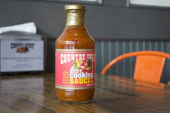 Country Sweet hot close-up texture on spoon, shows glossy viscosity and natural ingredients