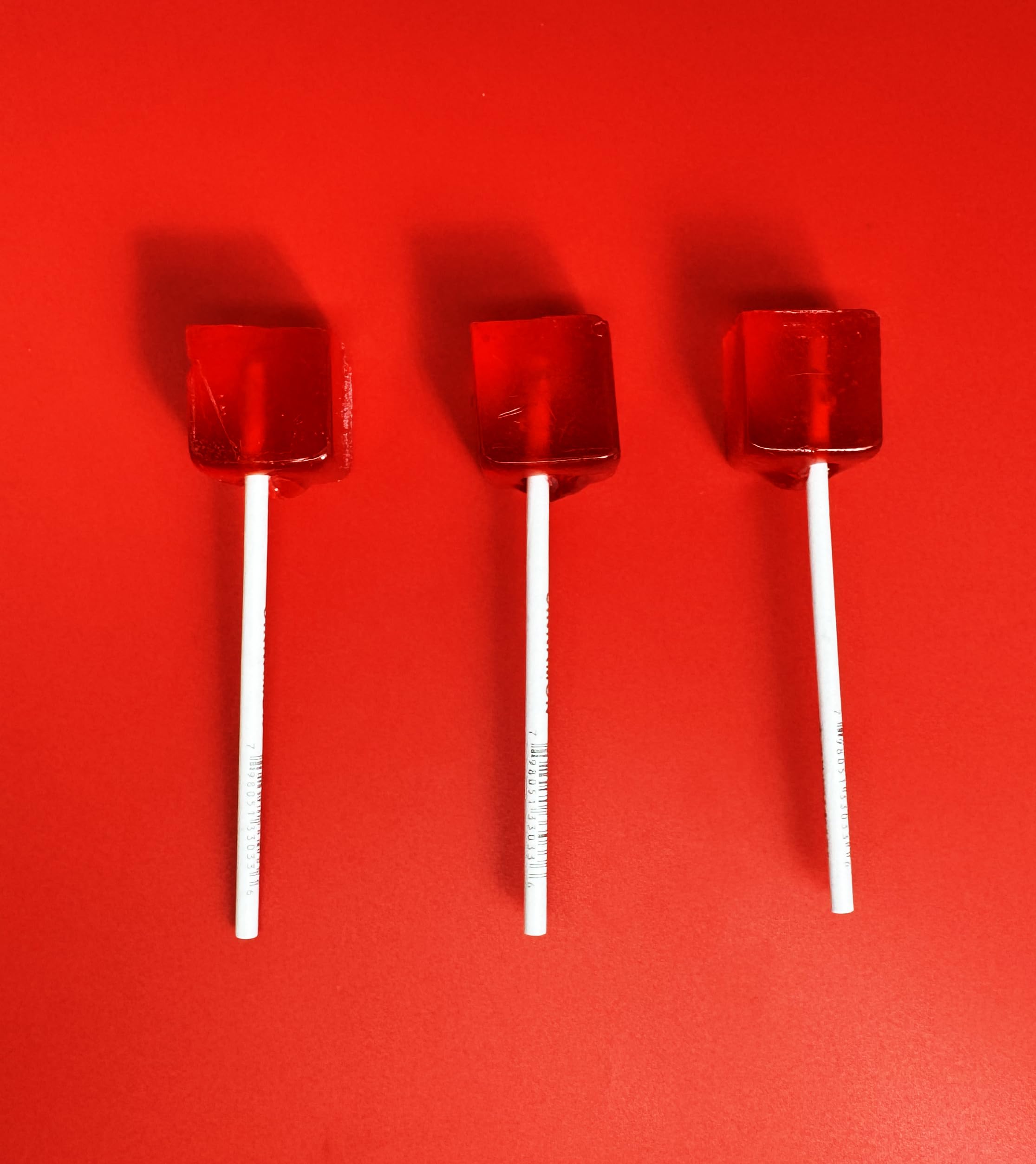 crait close-up of one-inch candy cube edges and surface, highlighting vibrant color