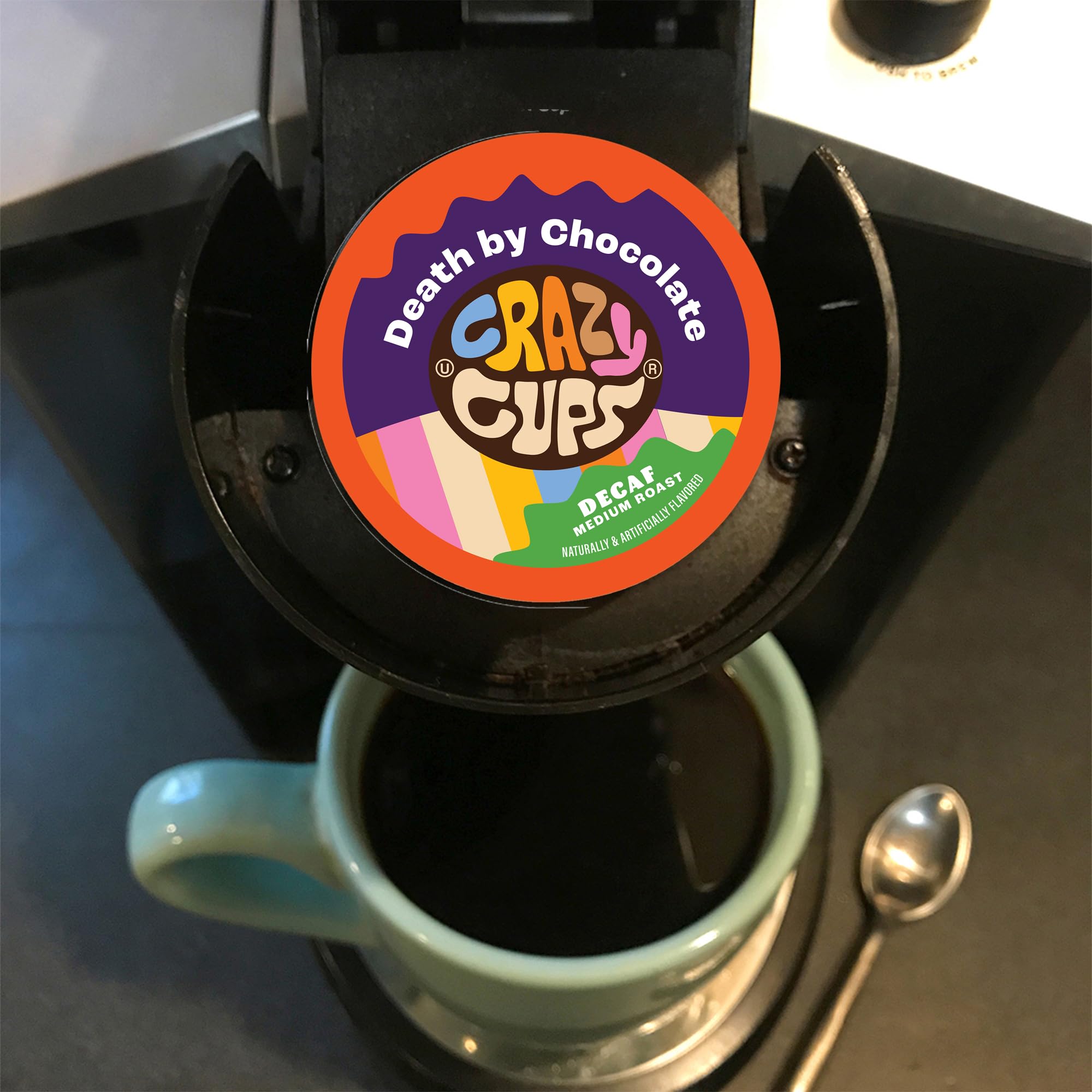 Crazy Cups brewed decaf cup with steam illustrating rich aroma and enjoyment